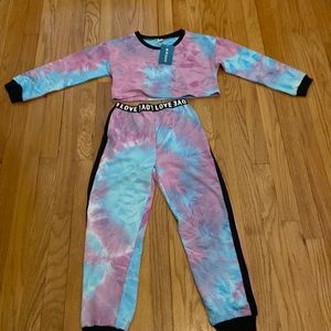 Tie-dyed track pants and crop top